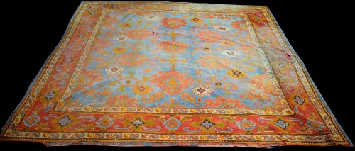 Lot 815 - An antique Ushak carpet, decorated with bold...
