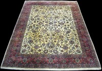 Lot 822 - A Tabriz carpet, the floral scrolling design...