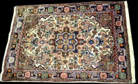 Lot 823 - A Jozan mat, the floral rosette surrounded by...