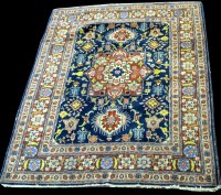 Lot 837 - A Tabriz rug, the central foliate medallion...