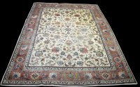 Lot 838 - A Tabriz carpet, with loose scrolling foliate...