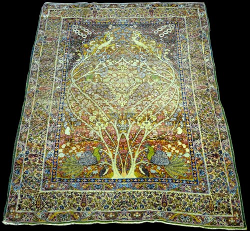 Lot 840 - A Lava Kirman rug, with tree of paradise...