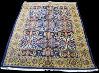 Lot 841 - A Kashan carpet, with bold floral design on...