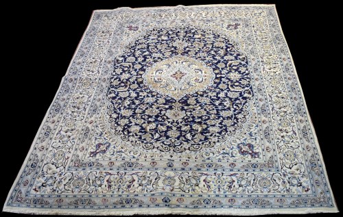Lot 843 - A Nain carpet, the central rosette surrounded...