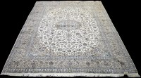 Lot 844 - A Persian Kashan carpet, the central rosette...