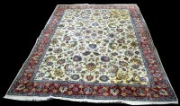 Lot 848 - A Tabriz carpet, with full floral scrolling...