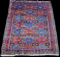 Lot 850 - An Afshar rug, the diamond-shaped panels with...