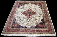 Lot 860 - A Tabriz carpet, the central medallion on...