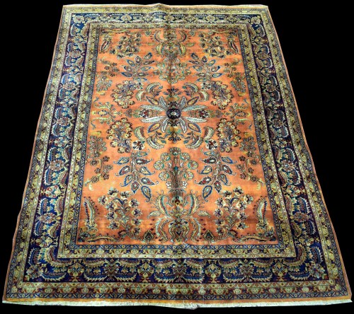 Lot 874 - A Sarough carpet, the central floral medallion...