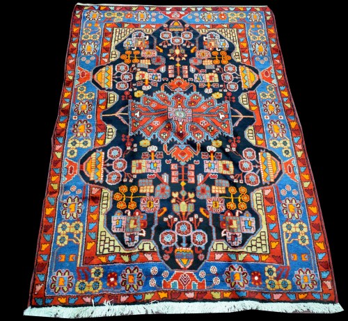 Lot 876 - A Coliaie carpet, with geometric rosette and...