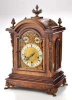 Lot 888 - An ornate late 19th Century German walnut...