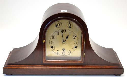 Lot 897 - An early 20th Century mahogany mantel clock,...