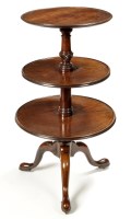 Lot 910 - A 19th Century three-tier circular mahogany...