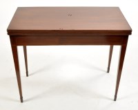 Lot 911 - A George III mahogany turnover top tea table,...