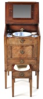 Lot 924 - A George III mahogany wash stand, the hinged...