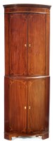 Lot 932 - An Edwardian inlaid mahogany corner cabinet,...