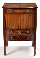 Lot 938 - A George III mahogany commode, the bowfront...