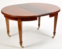 Lot 952 - A fine reproduction mahogany extending dining...