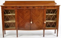 Lot 954 - An Edwardian inlaid mahogany bowfront display...