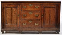 Lot 959 - An 18th Century and later oak dresser base,...