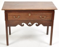 Lot 962 - A George III and later mahogany lowboy, the...