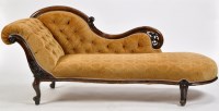 Lot 969 - A Victorian carved mahogany chaise longue,...