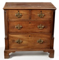 Lot 988 - A George III style mahogany chest of two short...