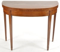 Lot 992 - An early 19th Century mahogany turnover top...