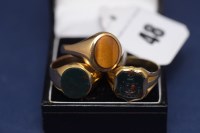Lot 48 - A 15ct. yellow gold signet ring set with...