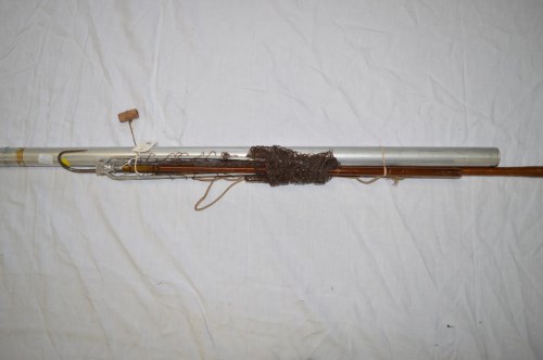 Lot 40 - An aluminium fishing rod tube; a gaff; and...