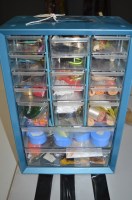 Lot 131 - A metal cabinet with clear plastic drawers...