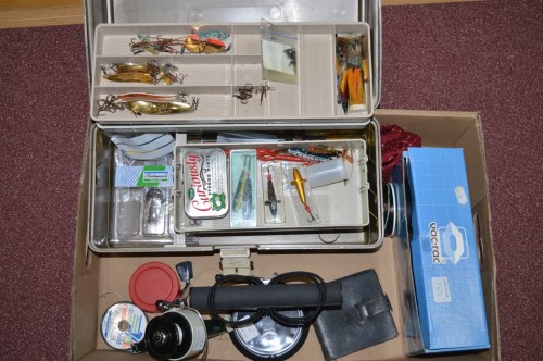 Lot 150 - A PLANO tackle box containing various fishing...