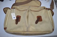 Lot 167 - Barbour: a modern leather trimmed canvas...