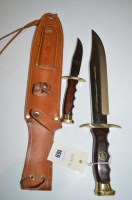 Lot 169 - INOX: a bowie style sheath knife with wooden...