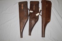 Lot 255 - Three Vintage leather leg-o-mutton gun cases.