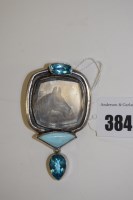 Lot 384 - A reverse engraved glass and blue stone...