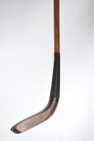 Lot 401 - A long nosed putter with hickory shaft with...