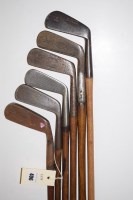 Lot 406 - Six hickory shafted putters, makers to include:...