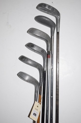 Lot 475 - Six steel shafted putters, makers to include:...