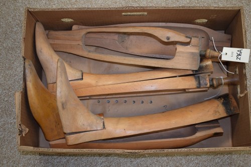 Lot 296 - Two riding boot trees and a spare foot piece.