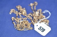 Lot 579 - A 9ct. yellow gold matching bracelet and...