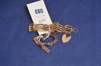 Lot 593 - A red stone and seed pearl bar brooch, stamped...