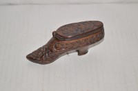 Lot 651 - A Victorian carved wooden snuff box in the...