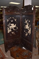 Lot 1122 - A Japanese carved stained wood and ivory...