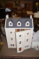 Lot 1147 - A Georgian style 'Town House' dolls house, the...