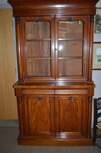 Lot 1271 - A Victorian mahogany bookcase, carved...