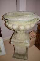 Lot 1296 - A 20th Century composite stone two handled...