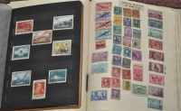 Lot 259 - Two stamp albums containing world stamps,...