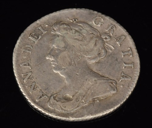 Lot 417 - A Queen Anne sixpence 1705, with roses and...