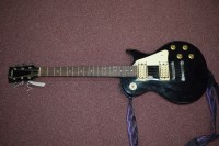 Lot 1517 - An Encore E99 electric guitar, in black...